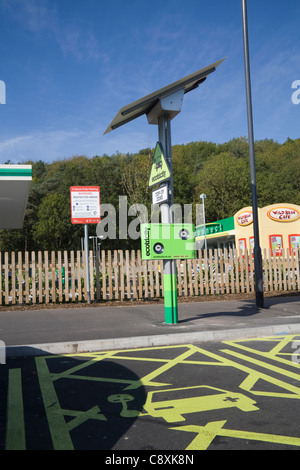 UK Ecotricity electric car charging point at Welcome Break motorway service station powered by solar panel Stock Photo