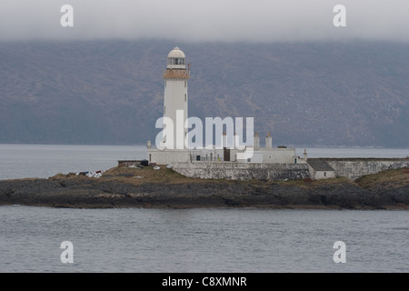 The lighthouse on Eilean Musdile, the tiny island off the southern tip of the Isle of Lismore, Inner Hebrides, Scotland. Stock Photo