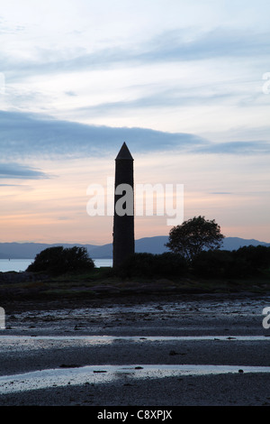 Sunset over the Pencil Monument in the seaside town of Largs on the Firth of Clyde, Ayrshire, Scotland, UK Stock Photo