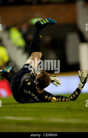 03.11.2011, London, England. Fulham's Australian goalkeeper Mark Schwarzer lays on the floor after conceding a goal during the UEFA Europa League Group football match between Fulham v Wisla Krakow from Poland, played at Craven Cottage.  Mandatory credit: ActionPlus Stock Photo