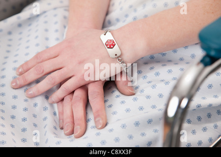 USA, Illinois, Metamora, Close-up on patient's hands Stock Photo