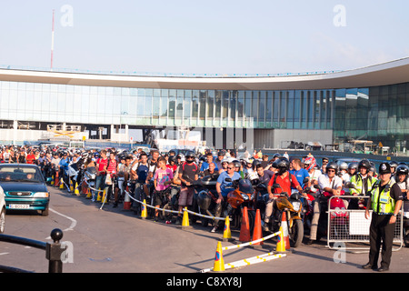 People waiting to cross border from Gibraltar to Spain next to the Gibraltar Airport new building during construction. Stock Photo