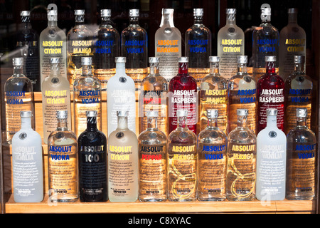 Detail of shop window with displayed Absolut Vodka collection. Stock Photo