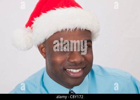 USA, Illinois, Metamora,  Portrait of smiling man in Santa hat Stock Photo
