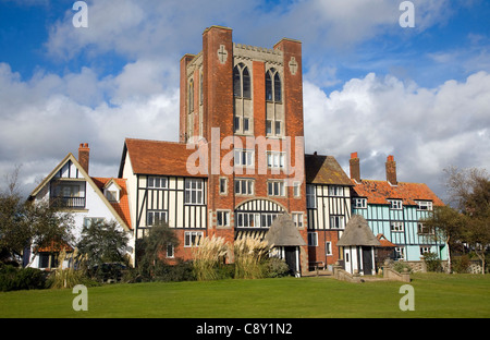 Eccentric mock Tudor architecture of water tower and houses, Thorpeness, Suffolk, England Stock Photo