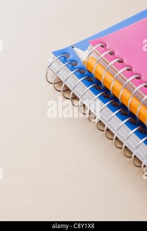 Close-up of  notebooks and pencil Stock Photo