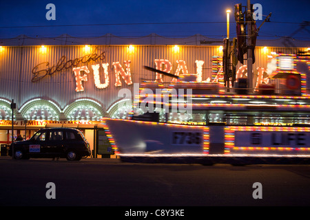 An electric tram themed as a ship on the promenade seafront at Blackpool, during the annual Blackpool illuminations, Lancashire, Stock Photo