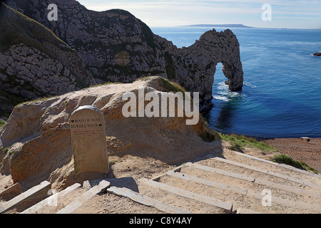 Signpost on the South West Coast Path above Durdle Door - a natural arch on the World Heritage Coast in Dorset England UK Stock Photo