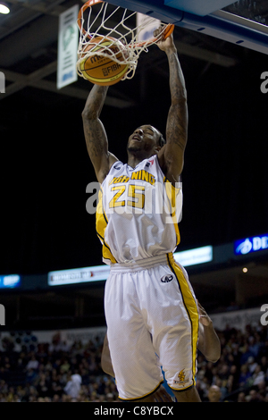 London Ontario, Canada - November 4, 2011. Gabe Freeman dunks the ball during a game against the Halifax Rainmen. London won the game 118-110 in front a crowd of 3600 spectators. Stock Photo