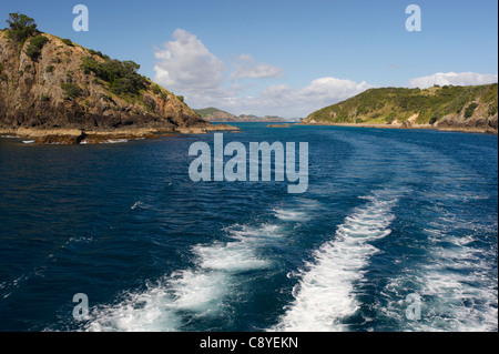 Wake from a boat traveling around the Bay of Islands, New Zealand Stock Photo