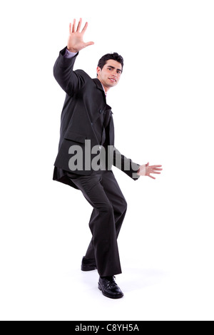 Scared businessman in a falling position (isolated on white) Stock Photo