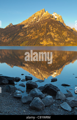 Jenny Lake in the Grand Teton National Park was formed approximately 12,000 years ago by glacial movement.  The lake is estimated to be well over 400 ft. deep and is over 1100 acres in size.   It is one of the major attractions in the park and has many activities both around it and nearby.  Interestingly in today's world, there was a study done in 2005 which indicated Jenny Lake's waters have not been harmed by air or water pollution. Stock Photo