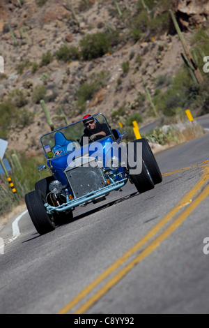 Hot rodders cruise through Gates Pass Arizona. Part of Freds 11th Anual T-Bucket Fun Run in Tucson Arizona. Stock Photo