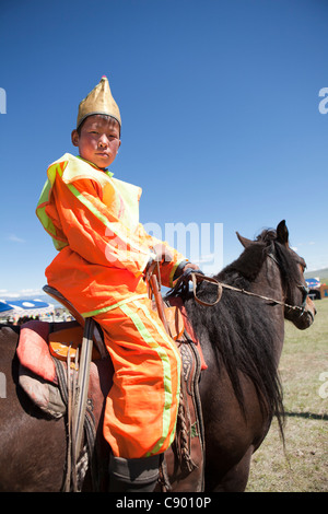 Mongolian boy get prize on Naadam festival horse racing, Tsagaannuur, Khövsgöl, Mongolia Stock Photo