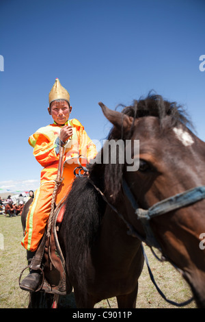 Mongolian boy get prize on Naadam festival horse racing, Tsagaannuur, Khövsgöl, Mongolia Stock Photo