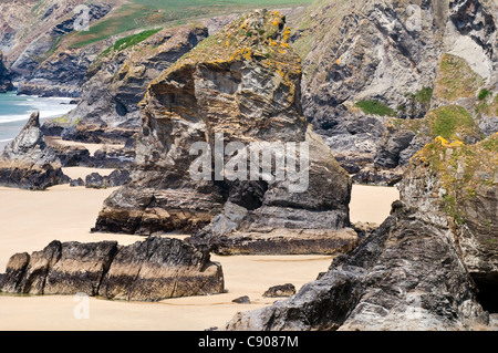 Rock formations on the beach at the spectacular Bedruthan Steps on the northern coast of Cornwall in England, UK Stock Photo