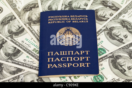 Belarusian passport on US dollars background Stock Photo