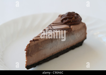 chocolate cheesecake slice white plate Stock Photo