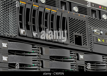 servers stack with hard drives in a datacenter for backup and data storage Stock Photo