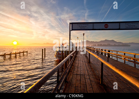 Morning mood in Gstadt with a view on Fraueninsel, Chiemsee, Chiemgau, Upper Bavaria, Bavaria, Germany Stock Photo