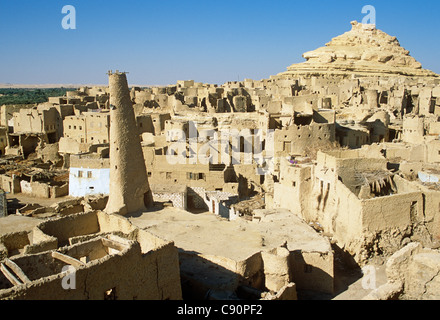 The ancient fortress of Siwa built of natural rock salt mud-brick and palm logs and known as the Shali Ghali are built in the Stock Photo