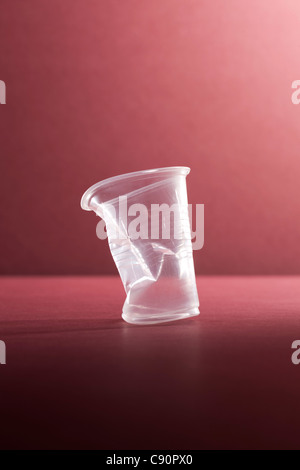 Crushed empty plastic cup, still life Stock Photo