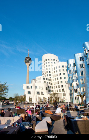 Modern buildings under blue sky Neuer Zollhof Frank O. Gehry Media Harbour Duesseldorf Duesseldorf North Rhine-Westphalia German Stock Photo