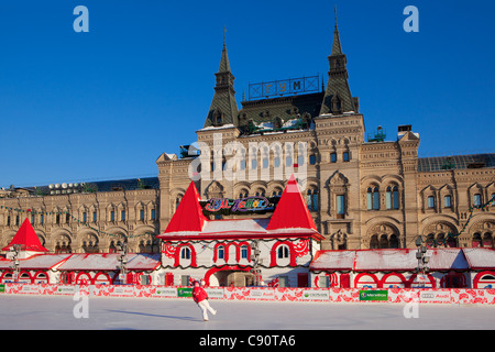 Ice skating rink outside the GUM Main Department Store (1893)  at the Red Square in Moscow, Russia Stock Photo