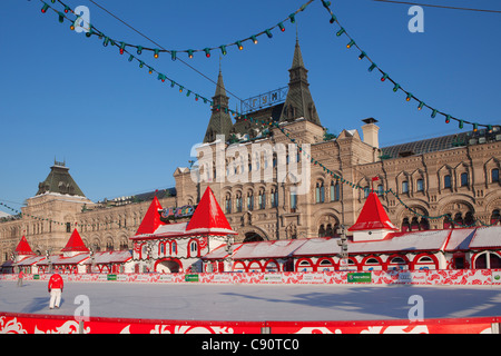 Ice skating rink outside the GUM Main Department Store (1893)  at the Red Square in Moscow, Russia Stock Photo