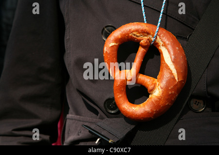 Clothes decorated with a pretzel at the Oktoberfest Beer Festival in Munich, Germany. Stock Photo