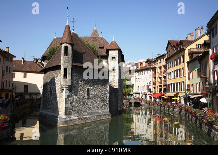 annecy is a historic town on the River Thiou. The Palais de l'Isle was built in the 12th century and was once a prison but is Stock Photo