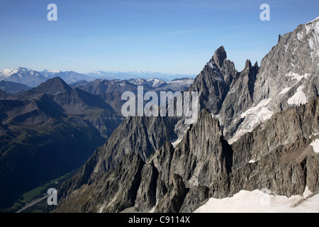 The Mont Blanc Massif is popular as a location for mountaineering hiking skiing and snowboarding winter and summer sports. Stock Photo