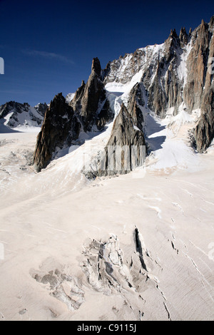 The Mont Blanc Massif is popular as a location for mountaineering hiking skiing and snowboarding winter and summer sports. Stock Photo