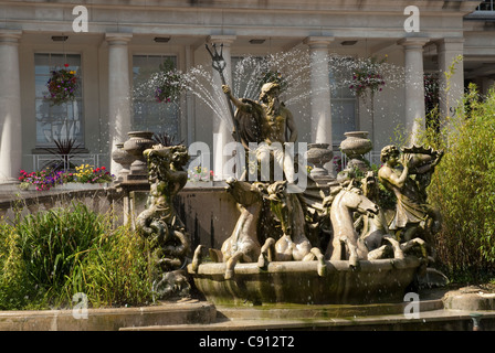 Statues of classical subjects and figures from Greek mythology are often found in the parks and cities of England. Stock Photo