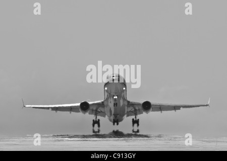 Bonaire Island, Dutch Caribbean, Kralendijk, KLM Douglas DC-10 airplane, taking off from Flamingo Airport. Black and white. Stock Photo