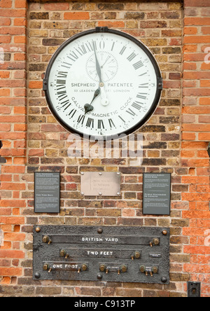 The Galvano-Magnetic Clock of 1852 on the Shepherd Gate is mounted on the east wall of the Royal Observatory building. It was Stock Photo