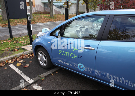 Nissan Leaf car seen charging its battery on Durham riverside, north east England, UK Stock Photo