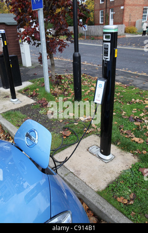 Nissan Leaf electric car seen charging its battery on Durham riverside, north east England, UK