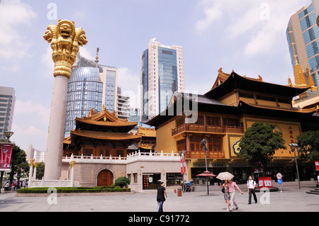 Jing'an Temple the Temple of Peace and Tranquility is a Buddhist temple on the busy shopping street West Nanjing Road in Stock Photo
