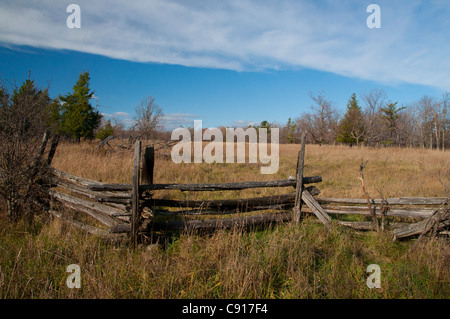 Split-rail fences and farm fields on Manitoulin Island, Ontario.. Stock Photo