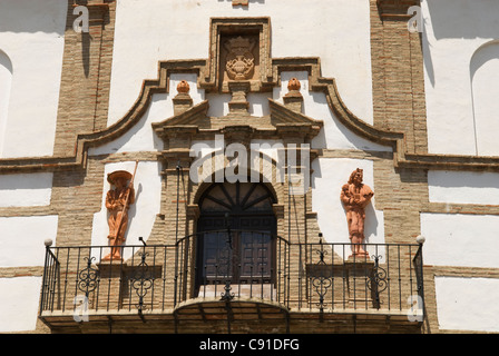 There is an ornate balcony above the entrance to the Bullring in plaza de Castilla Antequera. Stock Photo