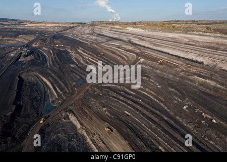 Aerial view of a bucket-wheel excavator with conveyor belt in for open-pit lignite mining brown coal Schoeningen Lower Saxony Ge Stock Photo