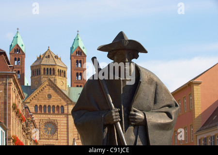 Sculpture of a pilgrim in Maximilianstrasse and Speyer cathedral, Rhineland-Palatinate, Germany, Europe Stock Photo