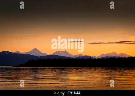 Sunset scenic of Fairweather Mountains as seen from Bartlett Cove, Gustavus, Glacier Bay National Park & Preserve, Alaska Stock Photo