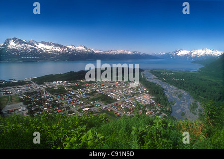 View of the coastal town of Valdez and the Trans Alaska Pipeline Service terminal and the waters of Prince William Sound, Alaska Stock Photo