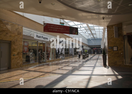 Inside glass covered Gloucester Quays retailers outlet shopping centre Stock Photo