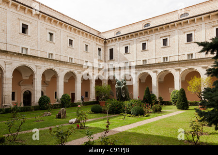 The entrance cloister of Monte cassino Abbey and the death of Saint Benedict Statue Stock Photo