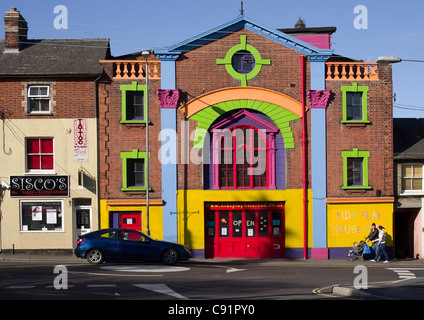 brightly painted former cinema THE SAVOY in Halstead Essex now used as a playgroup and kids party centre Stock Photo