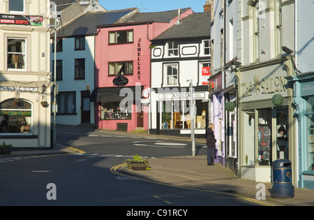 Man window shopping in in King Street, Ulverston, Cumbria, England UK Stock Photo