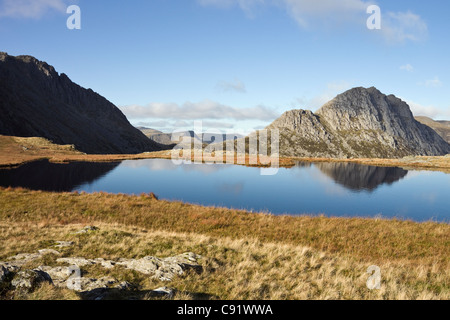 View across Llyn Y Caseg-fraith to Tryfan and Glyder Fach Bristly ridge in Snowdonia National Park mountains. North Wales, UK